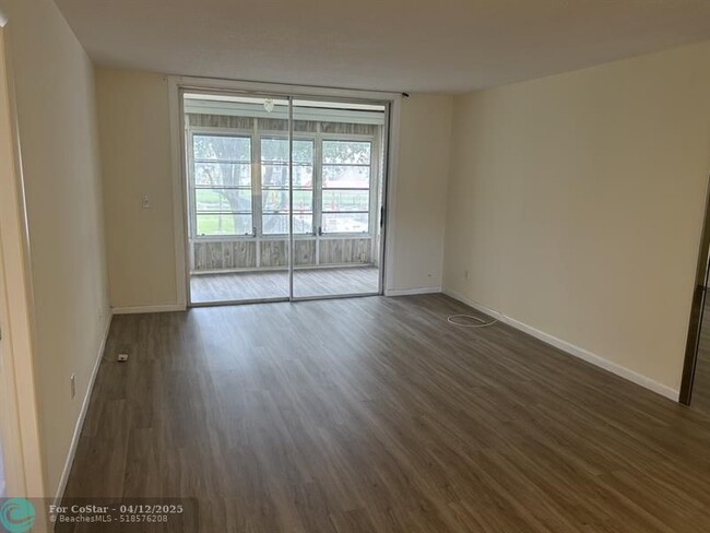 Building Photo - 6000 NW 64th Ave
