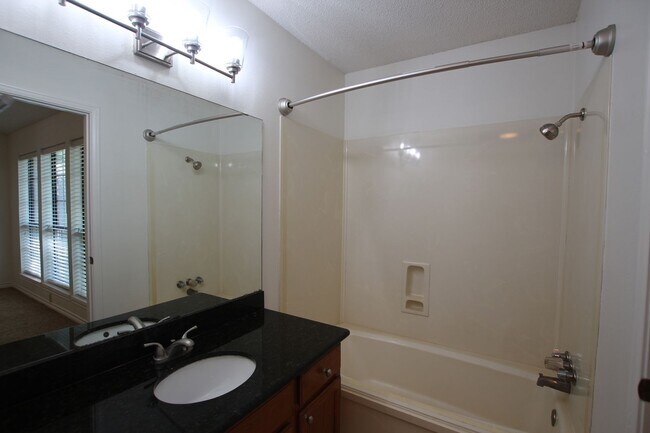 Building Photo - Available - Charming 2-bedroom, 2.5-bath townhome
