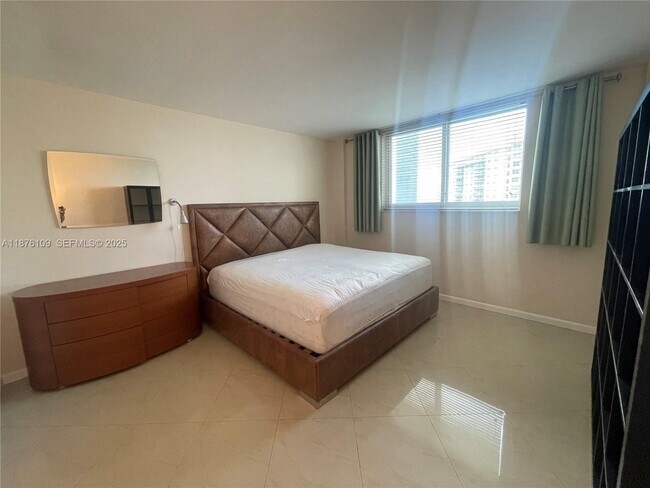 Building Photo - 19380 Collins Ave