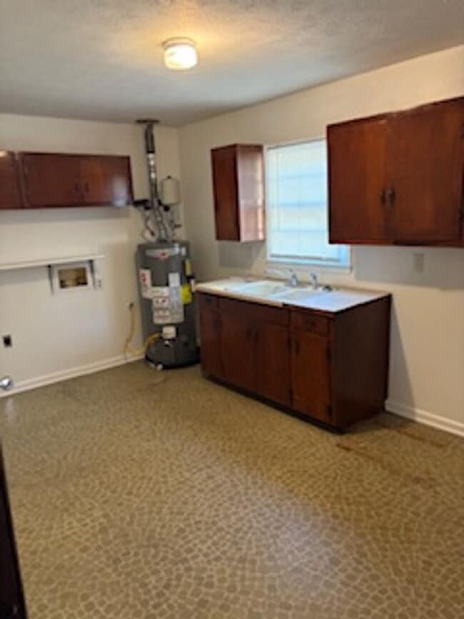 Building Photo - Keys to Happiness – Unlock Your New Home! Apply today. Call the office to schedule a tour.