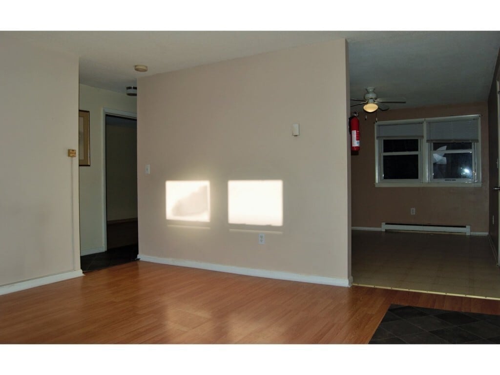 *Wall has been painted since photo was taken - 119 Main St