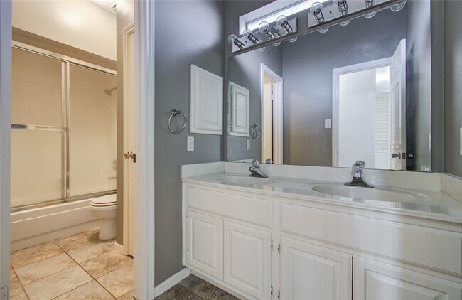 Building Photo - 14806 Flowerwood Dr