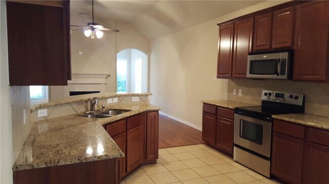 Building Photo - Charming two-story brick home in the desir...