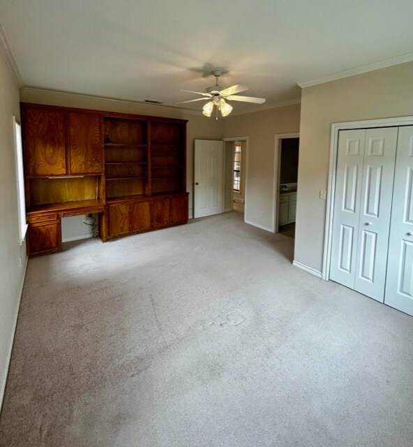 Master bedroom with built-in desk, shelves and cabinets - 806 Torribrooke Ln