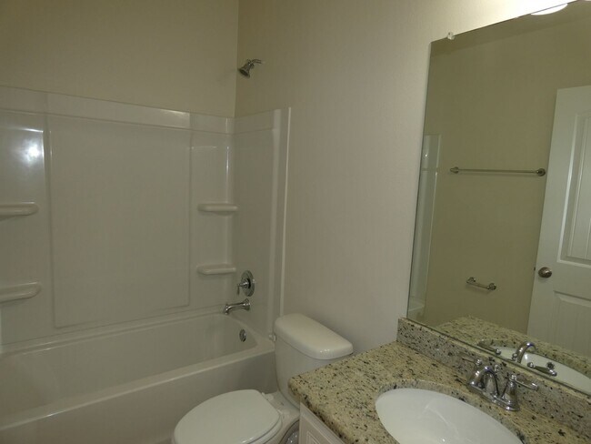 Building Photo - Spacious 5-Bedroom Home - Heart of Pace
