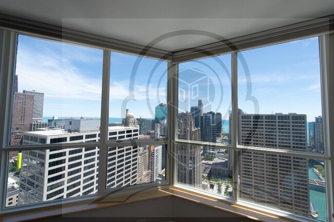 Building Photo - Stunning 46th Floor, 2 bedroom condo, righ...