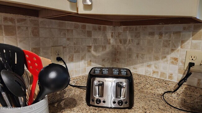 Building Photo - 5801 N Banana River Blvd