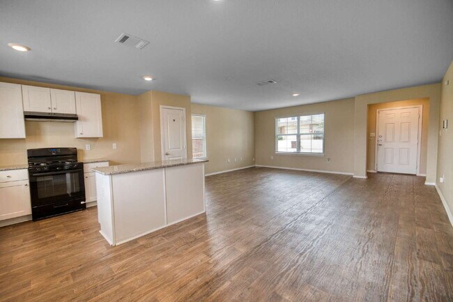 Building Photo - Energy-Efficient Living at $1,750 – Electricity Covered!