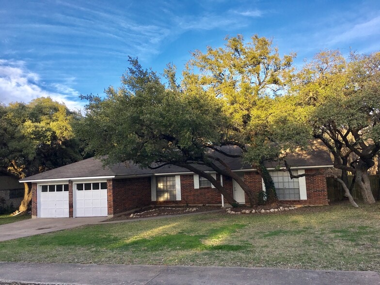 Beautiful brick home in quiet established neighborhood...You absolutely do not find this kind of lot with massive oaks in newer subdivisions! - 2400 Dijon Dr