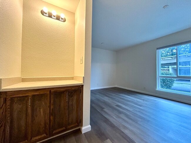 Building Photo - Beautiful Downstairs 2 Bedroom Condo Located In Gated Community Pool + Lake Access!