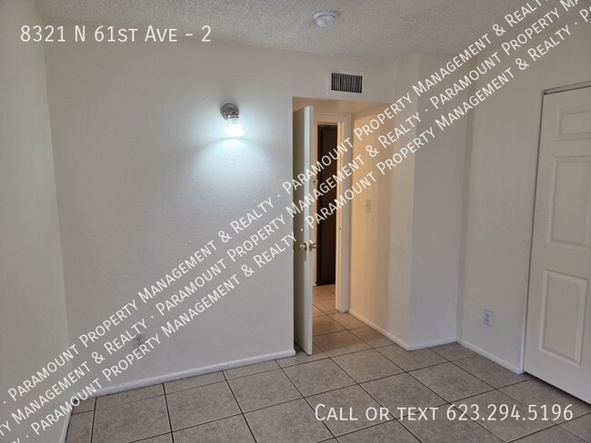 Building Photo - 8321 N 61st Ave