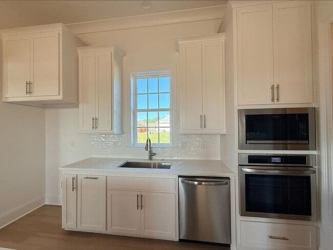 Building Photo - Luxury Living in Materra – The Fleur Plan by Level Homes | Move-In Ready May 2026