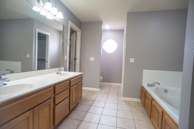 Building Photo - "Spacious 4-Bed Home with Granite Touch & ...