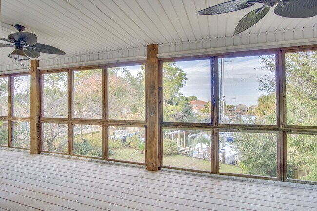 Building Photo - Live the Gulf Breeze Waterfront Life – Dock, Canal Access & Boat Lift!