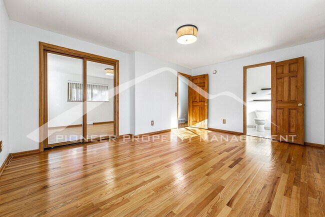 Building Photo - Spacious Home with Natural Light & Fenced Backyard