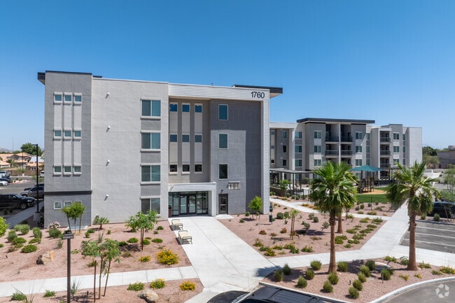 Building Photo - The Falls at Crismon Commons