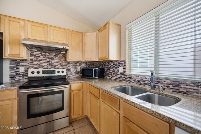 Building Photo - 4512 E Windsong Dr