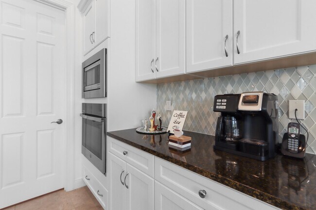 Building Photo - 9282 SW Miracoli Wy