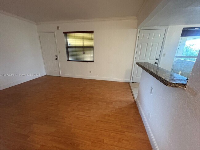 Building Photo - 241 S Royal Poinciana Blvd