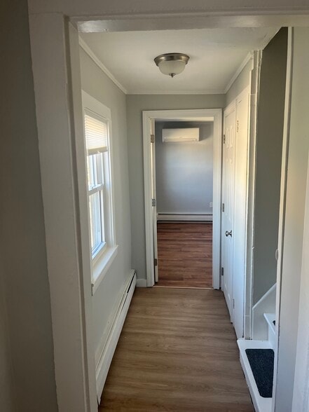 Hallway to second bedroom/stairs to 3rd floor - 9 Boynton St