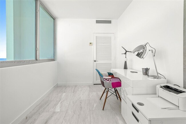 Building Photo - 5055 Collins Ave