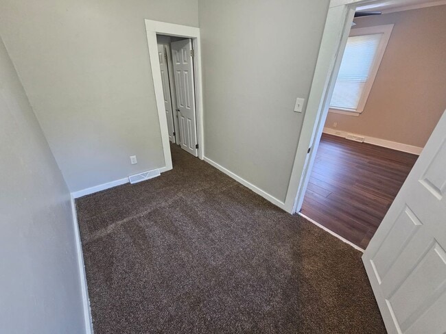 Building Photo - Spacious 4-Bedroom Cleveland Home with Updated Flooring & 2-Car Garage