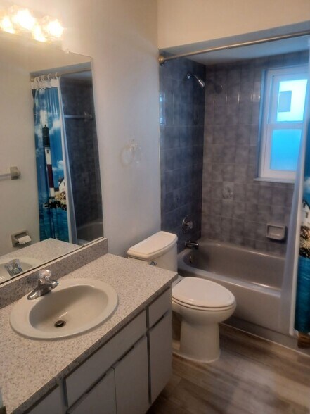 Building Photo - COMING SOON: Spacious Gulf Access 3 BR / 3 BA Home With a Large Screened Lanai for Entertaining &...