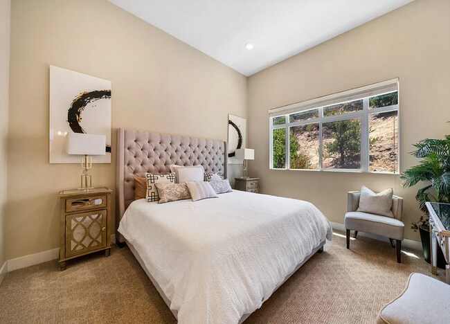Building Photo - Tucked within the Hollywood Hills in a gated community