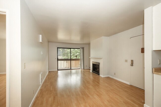 Building Photo - Peaceful Forest-View Condo with Fireplace & Private Balcony in Golden Oaks