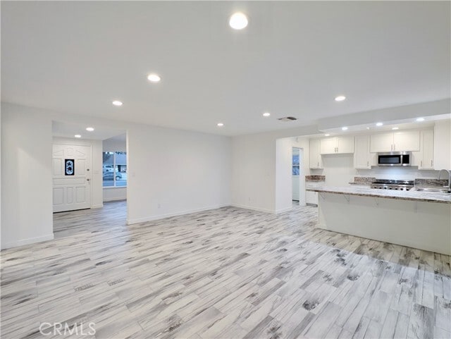 Building Photo - 12319 Woodley Ave