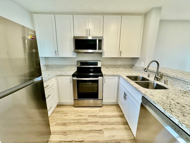 Building Photo - Beautifully Upgraded 2-Bedroom Condo in La...