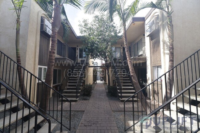 Building Photo - 2-Bed, 2-Bath Condo with One Car Garage