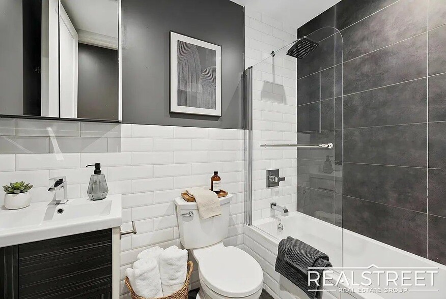 Building Photo - Modern Bushwick 2-bedroom, 2.5-bath duplex with private garden, deck, and finished recreation room —