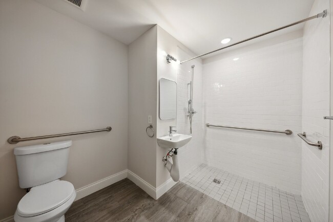 Building Photo - "NEW CONSTRUCTION 3-Bed Condo with Granite...