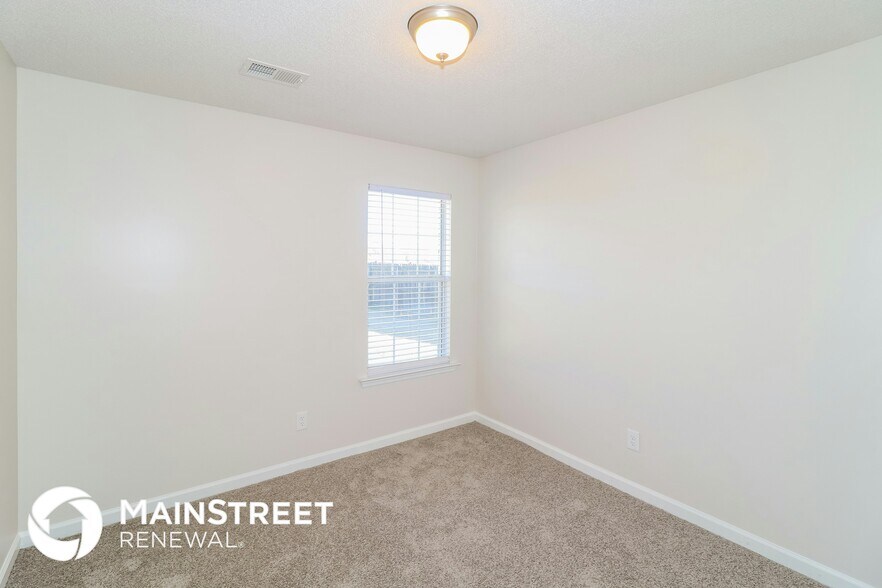 Building Photo - 5890 Carrel Cove