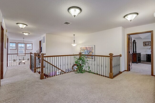 Building Photo - Grand 5 bed 4.5 bath Maple Grove Home w/ 3-Car Garage! Fully Furnished