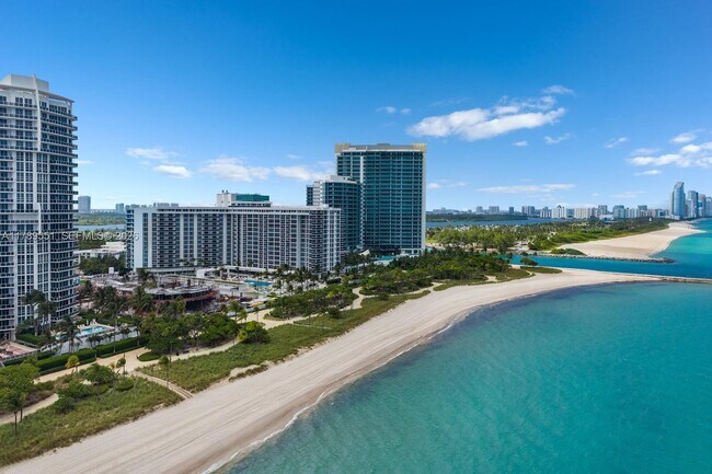 Building Photo - 10275 Collins Ave
