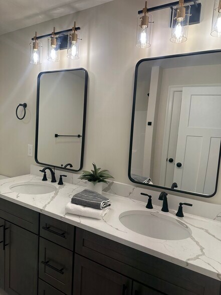 Double sinks in upstairs common bathroom. - 29 Liberty St