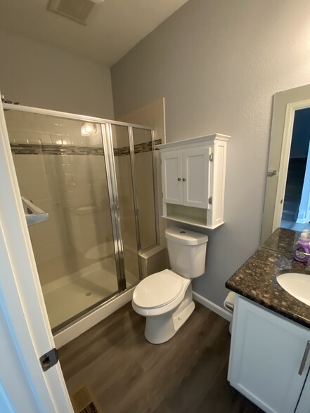 Ground floor full bathroom with shower - 16155 W 62nd Ln