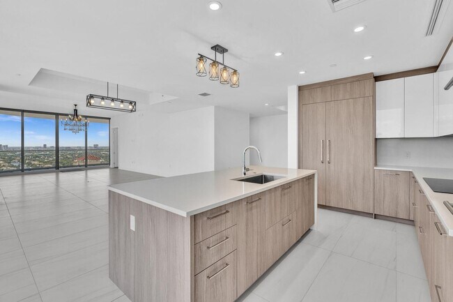 Building Photo - Stunning High-Rise Condo with Ocean Views | Prime Beach Location