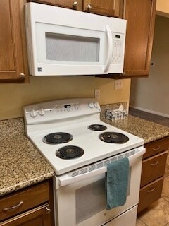 New Stove and Microwave - 9200 Madison Ave
