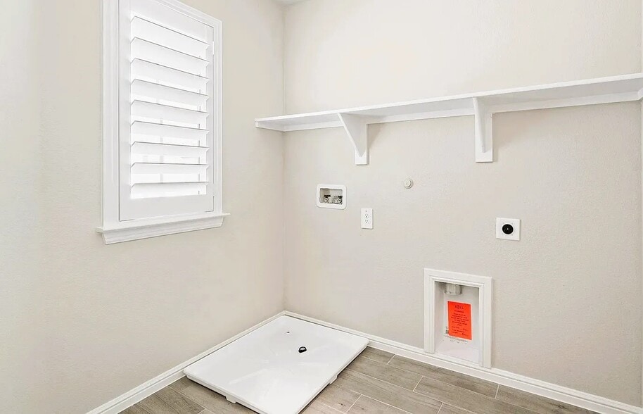 2nd floor laundry room - washer and dryer to be included - 3417 Lake District Ln