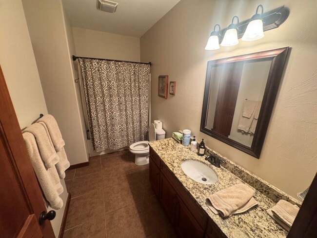 Building Photo - Large, Open Home with Beautiful Backyard and Oversized Garage