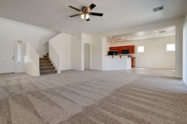 Building Photo - 4 Bedroom in Tolleson.  Landscaping redone.  Newer Carpet, Available February 1st!!!  Great 2 sto...