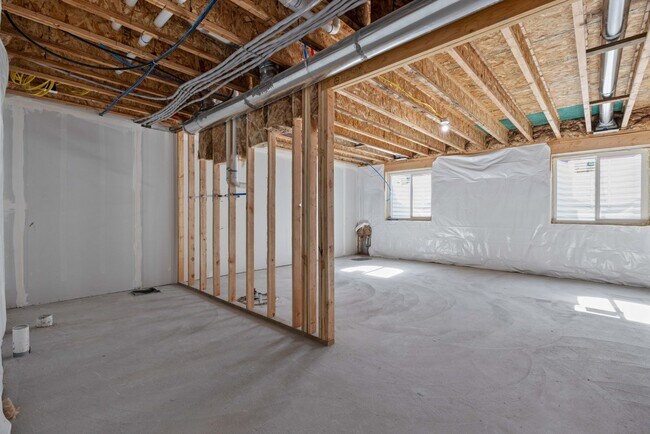 Building Photo - New St. Anthony Townhome with Unfinished Basement & Private Patio