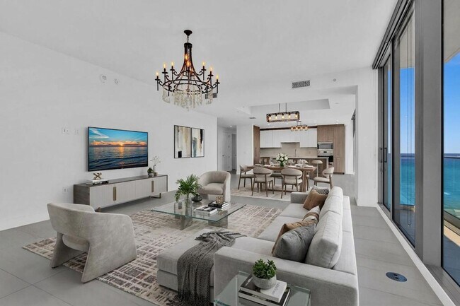 Building Photo - Stunning High-Rise Condo with Ocean Views | Prime Beach Location