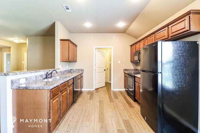Building Photo - 6413 Amalie Dr