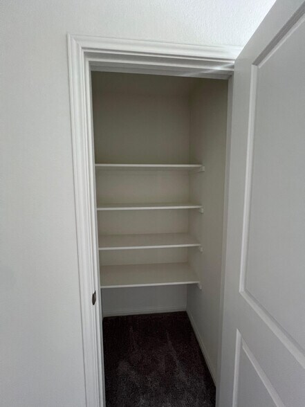 Upstairs Hallway Closet - 407 Estuary Dr