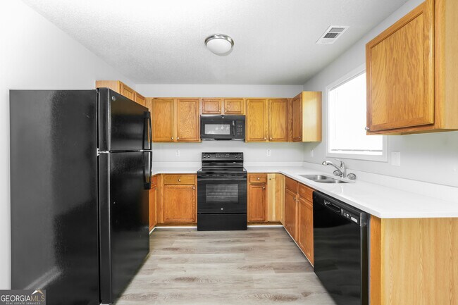 Building Photo - 6930 Red Bone Way