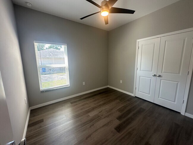 Building Photo - AVAILABLE MID APRIL- 4 Bedroom 2 bathroom 3 Car Garage NE Cape Coral Home with Screened Lania